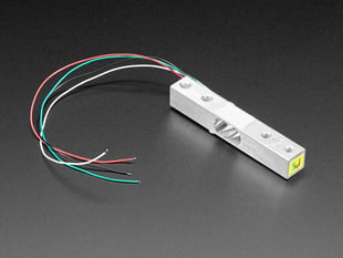 Angled shot of a Strain Gauge Load Cell with four wires.
