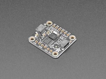 Adafruit 9-DOF Orientation IMU Fusion Breakout - BNO085 (BNO080) - STEMMA QT / Qwiic - Angled shot of a Adafruit 9-DOF Orientation IMU Fusion Breakout board.