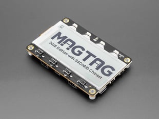 Angled shot of rectangle-shaped electronic ink display breakout with the text: "MAGTAG 2025 Edition with SSD1680 Chipset"