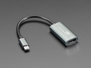Angled shot of a HDMI to USB-C Video Capture Adapter.