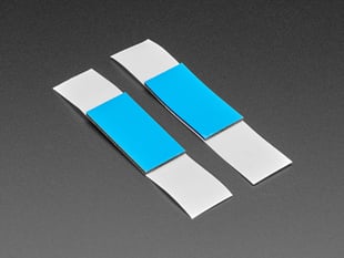 Angled shot of single blue rectangular foam tape.