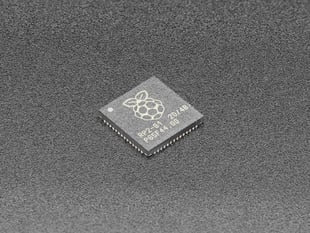 Angled shot of single RP2040 microchip.