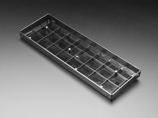 Angled shot of a Translucent Smoke Plastic 65% / JKDK K68 Keyboard Shell. 