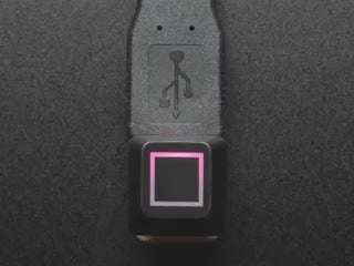 Close-up video of Zener ESP Square keycap glowing rainbow colors.