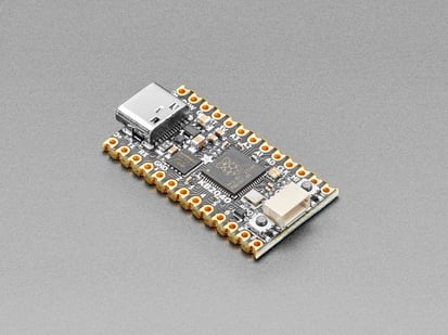 Adafruit KB2040 - RP2040 Kee Boar Driver - Angled shot of short black microcontroller.