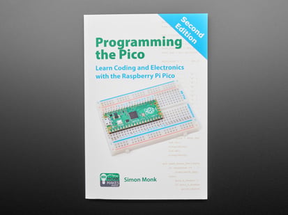Programming the Pico: Learn Coding & Electronics w/ the Pico - 2nd Edition by Simon Monk - Front cover of technical book: "Programming the Pico. Learn Coding and Electronics with the Raspberry Pi Pico." Cover art is an angled photograph of a long green rectangular microcontroller assembled into a half-size breadboard.
