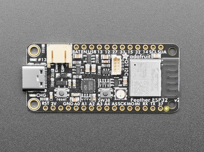 Adafruit ESP32 Feather V2 -  8MB Flash + 2 MB PSRAM - STEMMA QT - Top view of black rectangle-shaped microcontroller.