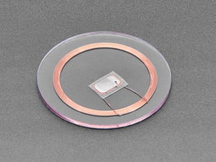Angled Shot of the 13.56MHz RFID/NFC Clear Tag - NTAG213 Chip.
