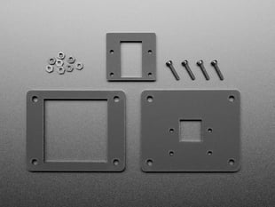 Overhead shot of black, acrylic panel mount pieces and mounting hardware.