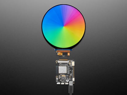 Round RGB TTL TFT Display - 4" 720x720 - No Touchscreen - NV3052C - NV3052C - Overhead shot of round TFT display with a color gradient rainbow image.