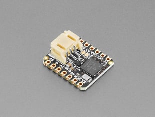 Angled shot of small, square CAN board with a tan JST-PH connector.