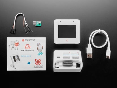 Espressif ESP32-S3-BOX-3B - Overhead shot of electronics kit for white, square-shaped IoT display device.