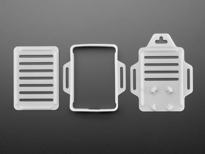 Snap-on Enclosure for Adafruit QT Py - Overhead shot of three 3D-printed enclosure pieces.