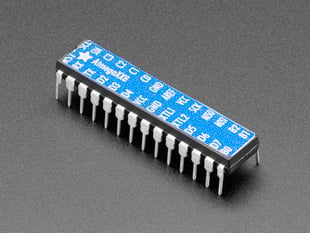 Adafruit AVR ATmegaXX8 Pinout Sticker displayed on a chip 