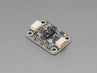 Angled shot of black, rectangular light sensor breakout.