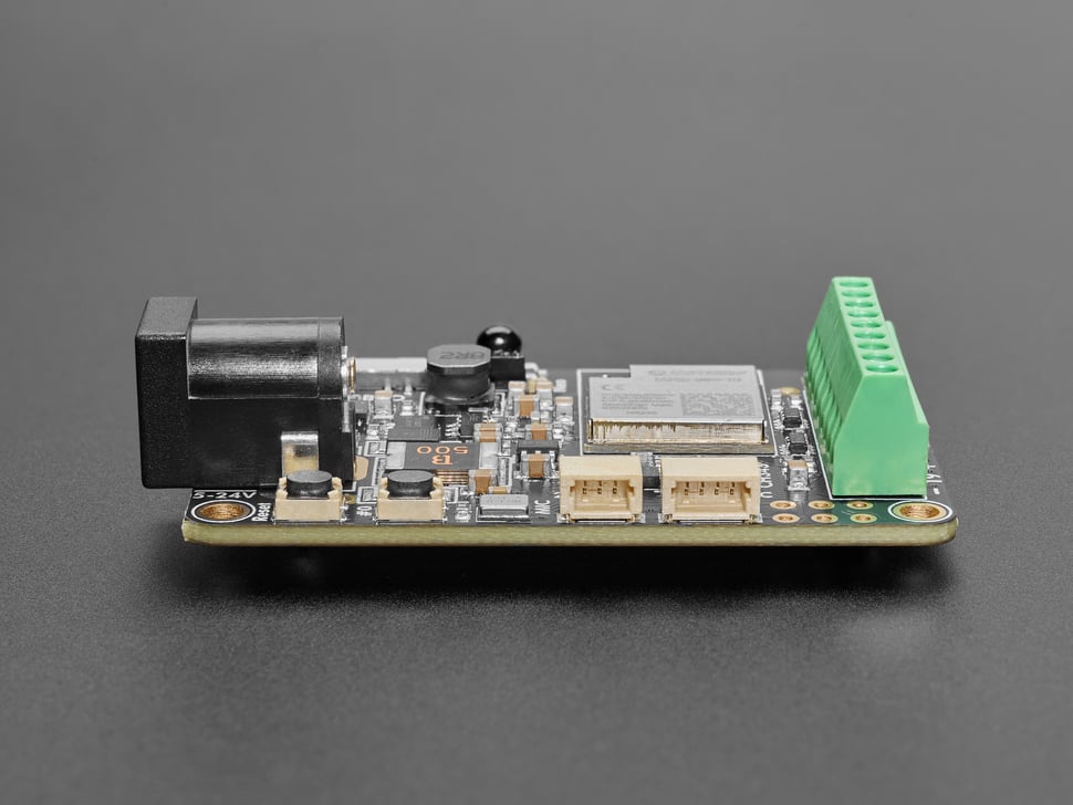Close-up of JST connectors and buttons on LED driver board.