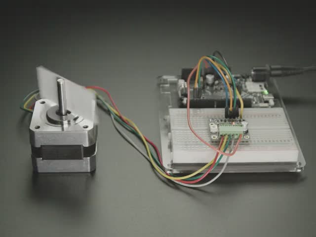 Adafruit A4988 Stepper Motor Driver Breakout Board - Video of a motor stepper driver board driving a stepper motor connected to a microcontroller.