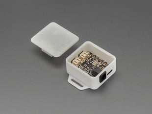Angled shot of solar charger PCB in enclosure with lid off.