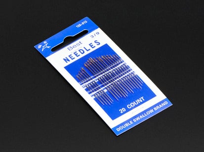 Needle set - 3/9 sizes - 20 needles - Small blue packaging containing 20 sewing needles.