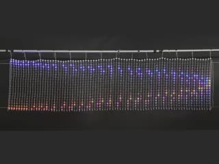 Video of LED netting emitting a a brightly colored wavelength animation.