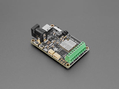 Adafruit Sparkle Motion with wFL External Antenna - WLED and xLights Board - WLED and xLights Board - Angled shot of rectangular LED driver board.