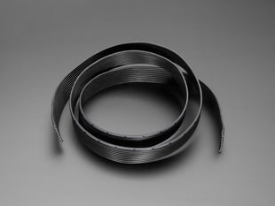 Coiled silicone ribbon cable.