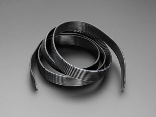 Coiled silicone ribbon cable.