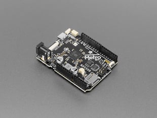 Angled shot of black, credit card-sized microcontroller.