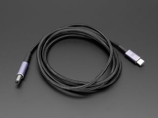 Angled shot of a USB-C to barrel jack cable.
