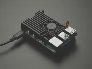 Video of microcontroller in assembled metal case with fan running.