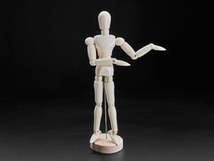 20cm tall wooden mannequin with arms gesturing.