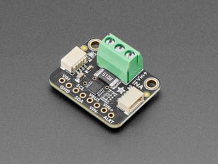Angled shot of small, black, square DC power breakout board.