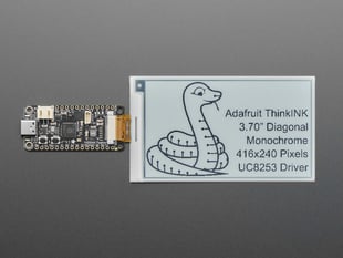 Overhead shot of 3.7" electronic ink display with a black and white python and text: "Adafruit ThinkINK 3.70" Diagonal Monochrome 416x240 Pixels UC8253 Driver"