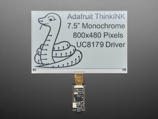 Overhead shot of 3.7" electronic ink display with a black and white python and text: "Adafruit ThinkINK 7.5" Diagonal Monochrome 800x480 Pixels UC8197 Driver"