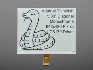 Overhead shot of 5.83" monochrome electronic ink display. Graphic features a friendly python and text: "Adafruit ThinkINK 5.83" Diagonal Monochrome 648x480 Pixels UC8179 Driver."