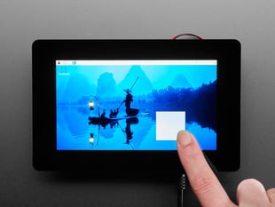 Finger creating a box on a touchscreen.