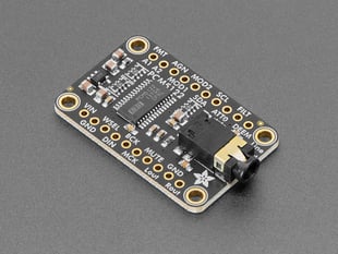 Angled shot of audio breakout board with 3.5mm jack.