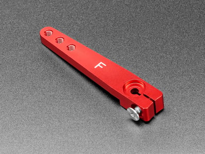 Machined Red Aluminum Servo Arm - 1.75" Long - Angled shot of red, metal, servo arm.