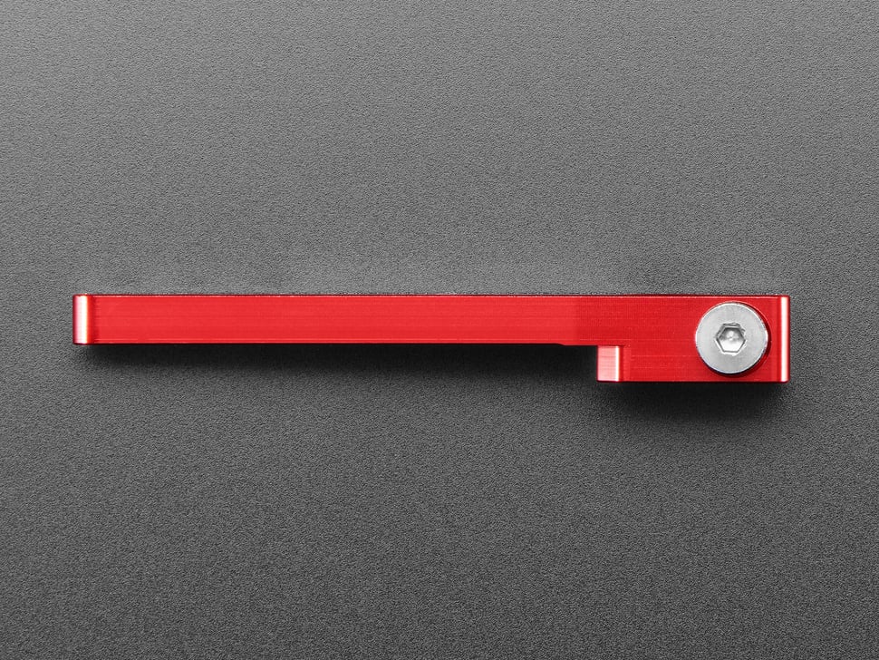 Angled shot of red, metal, servo arm on its side