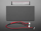 Overhead shot of LED matrix panel, IDC cable, and power cables.