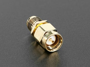 RF adapter with RP-SMA jack and SMA plug.