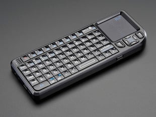 Angled shot of Miniature Wireless USB keyboard with touchpad