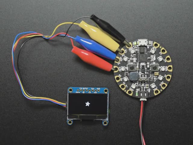 Monochrome 1.3" 128x64 OLED graphic display - STEMMA QT / Qwiic - Monochrome 1.3" OLED module with Adafruit logos falling like snow