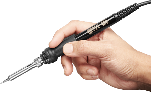 Hand holding a black soldering iron